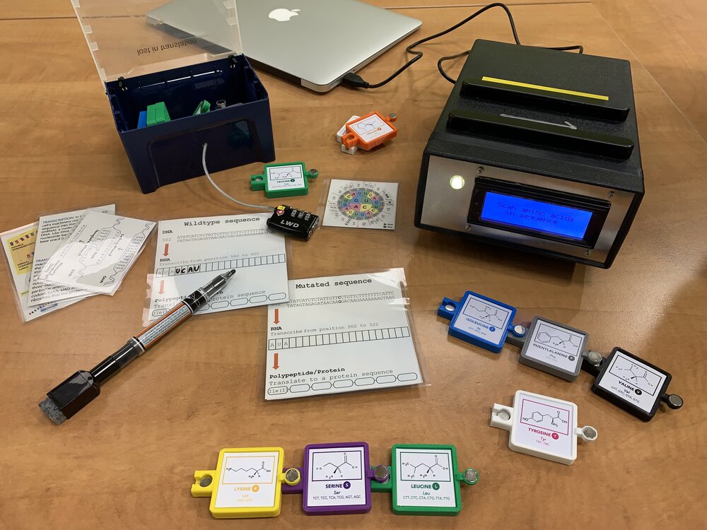 The Unlocking Genetic Editing workshop kit laid out on a desk