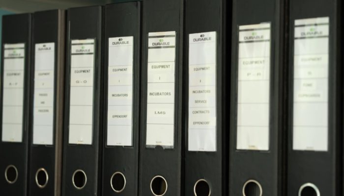 Archival files on shelf in the admin office