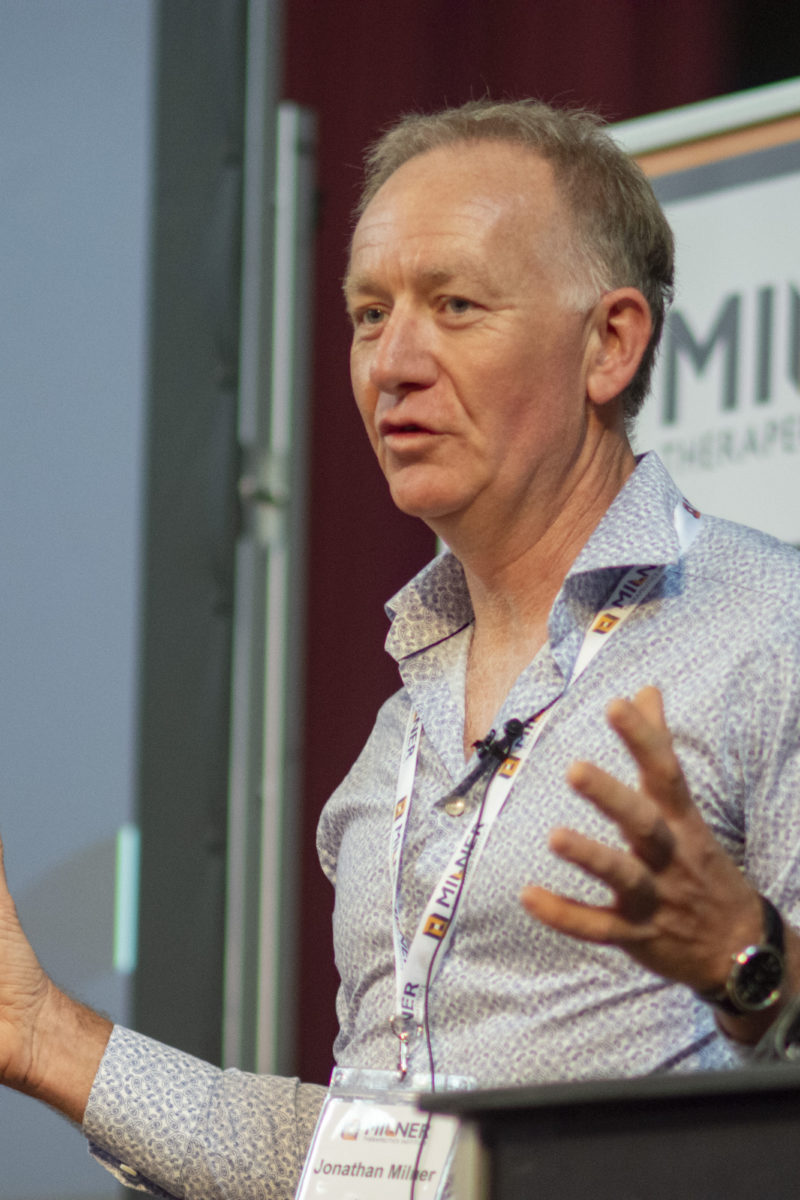 Jonathan Milner speaking at a conference